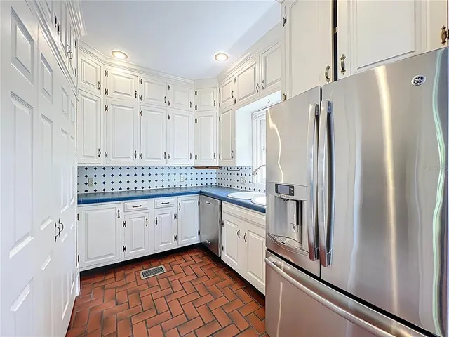 a view of a house with wooden floor and windows