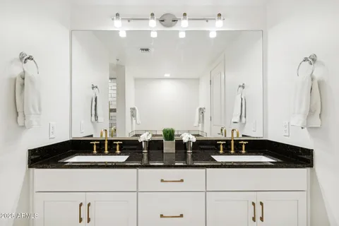 a view of buildings from the balcony