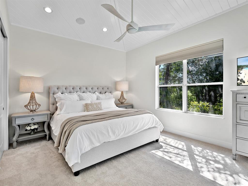7431 Greystone Street Lakewood Ranch, FL 34202 - Photo 48 of 85 a bedroom with a bed and a window
