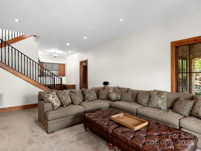 a living room with furniture and a couch