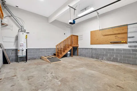 a view of a hall with wooden floor