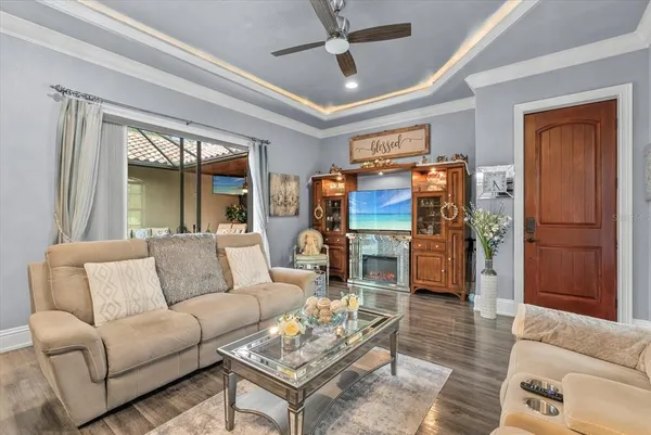a living room with furniture and a window