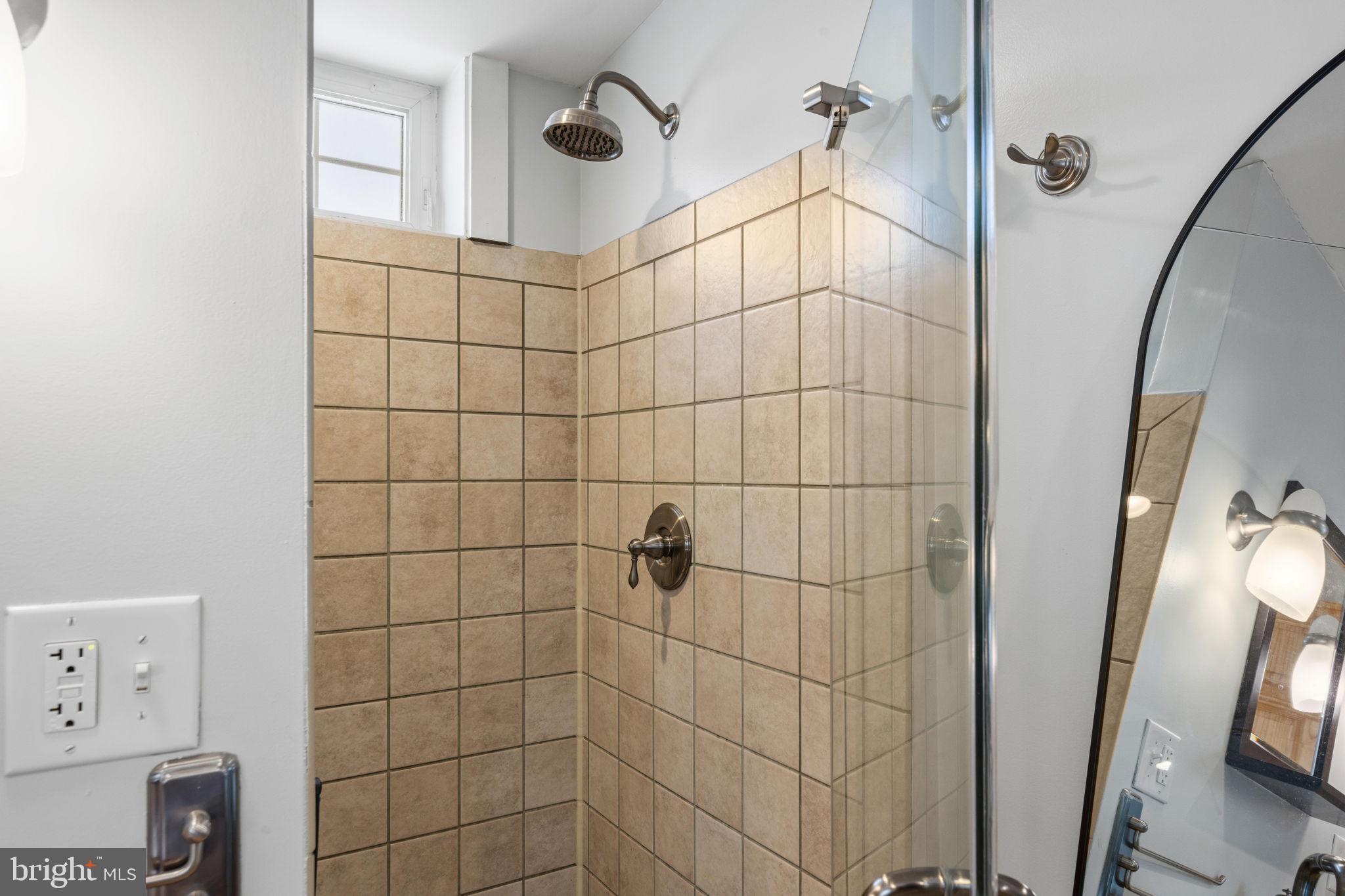 3208 Elliott Street Baltimore, MD 21224 - Photo 30 of 42 a bathroom with a shower