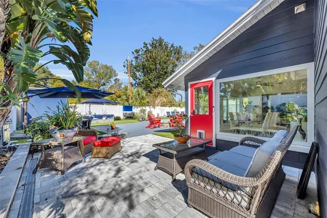an aerial view of house with a yard