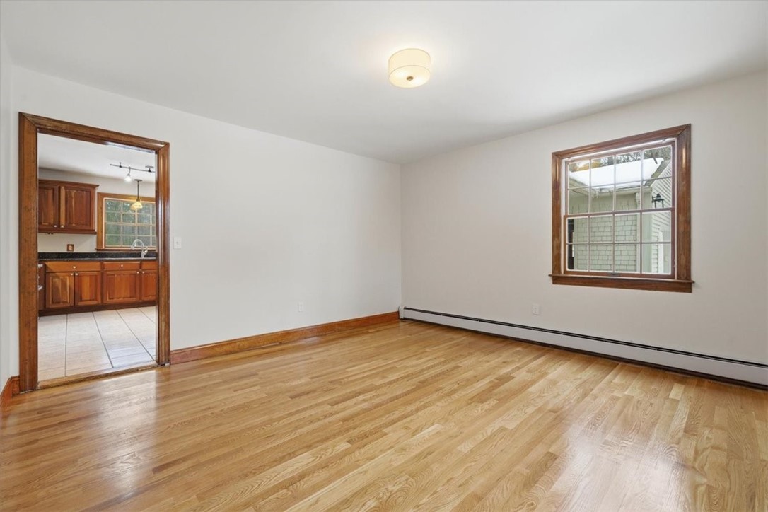 449 Widow Sweets Road Exeter, RI 02822 - Photo 11 of 50 Formal dining room connects to the kitchen