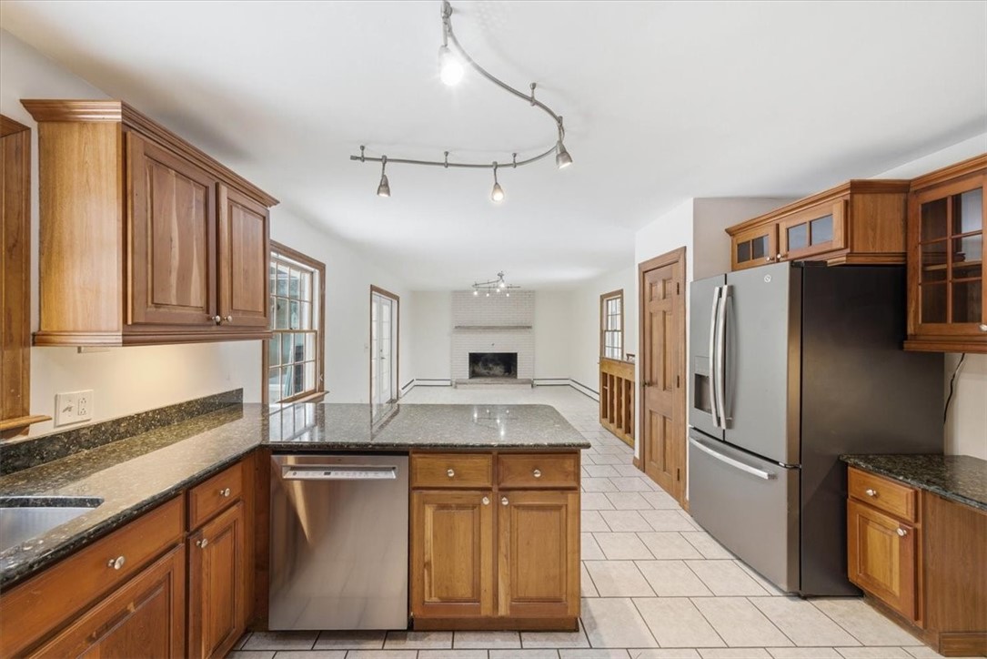 449 Widow Sweets Road Exeter, RI 02822 - Photo 18 of 50 View from kitchen looking towards the family room