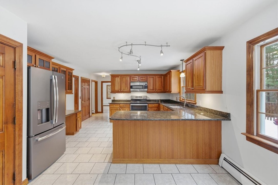 449 Widow Sweets Road Exeter, RI 02822 - Photo 19 of 50 View of kitchen from family room