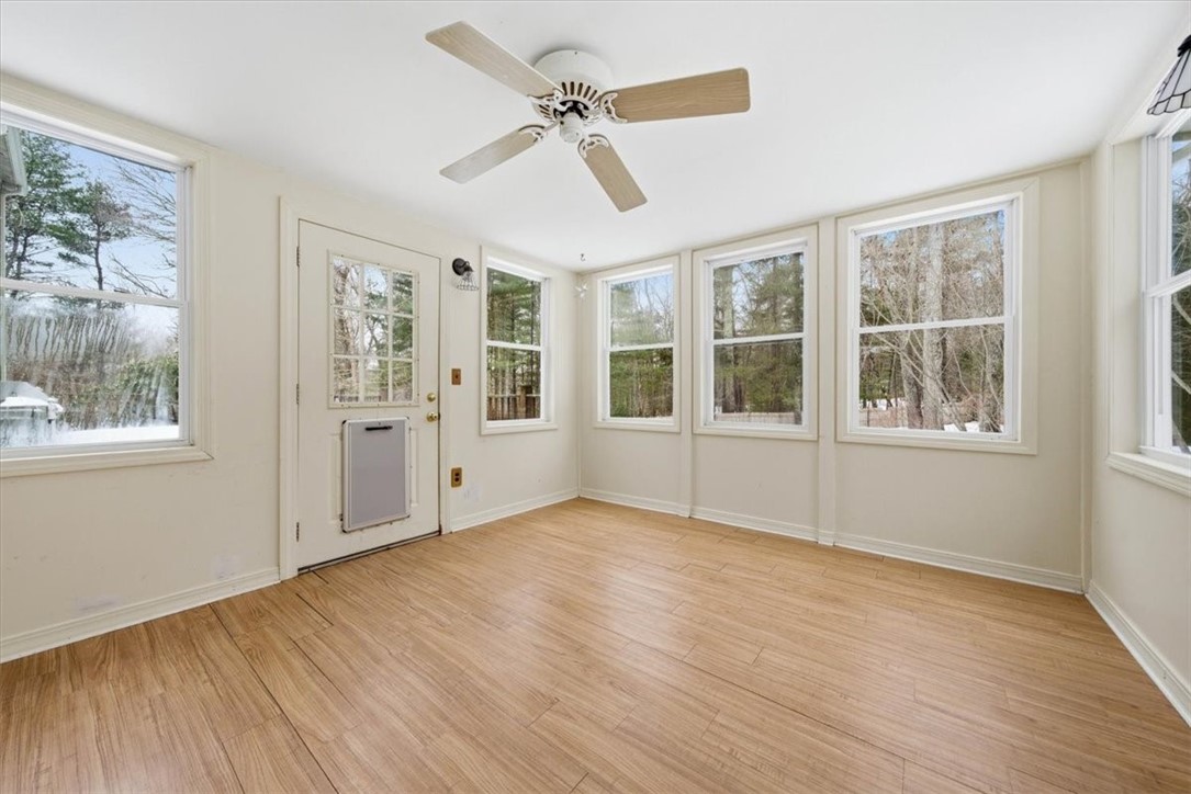 449 Widow Sweets Road Exeter, RI 02822 - Photo 22 of 50 Sunporch right off the family room - leads to deck