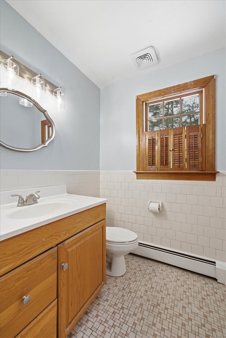 449 Widow Sweets Road Exeter, RI 02822 - Photo 24 of 50 Half bath on main level