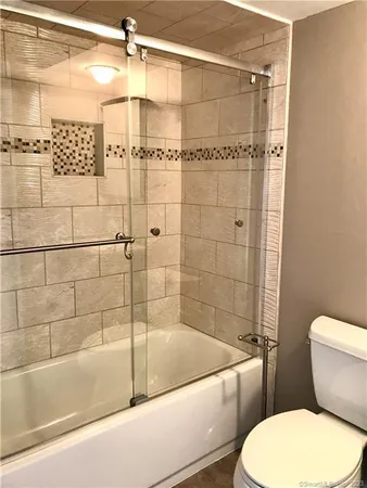 a view of a hallway with front door