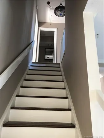 a view of a balcony with wooden floor