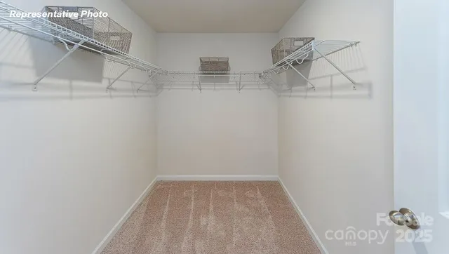 a bathroom with a granite countertop sink toilet a large mirror a bathtub and shower