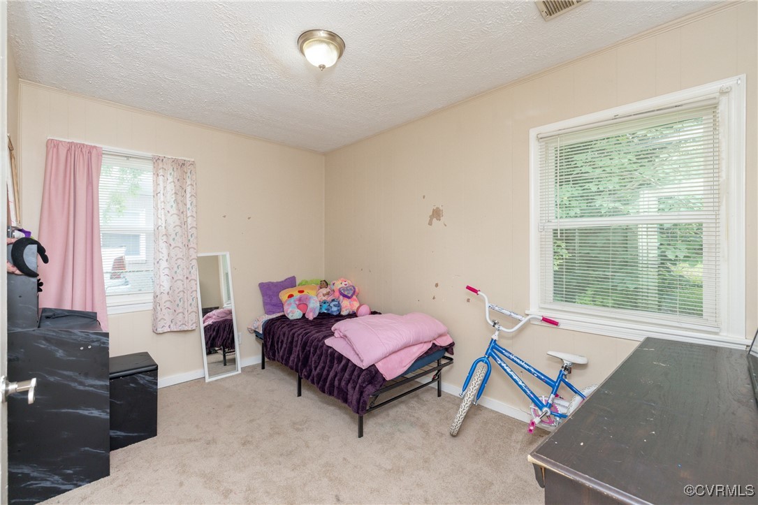 3425 Reynolds Road Richmond, VA 23223 - Photo 11 of 15 Carpeted bedroom featuring