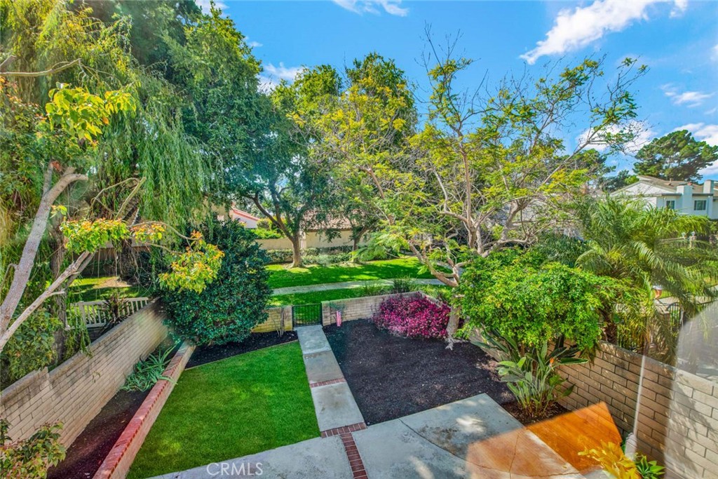 60 Willow Tree Lane Irvine, CA 92612 - Photo 39 of 74 a view of a yard with large trees
