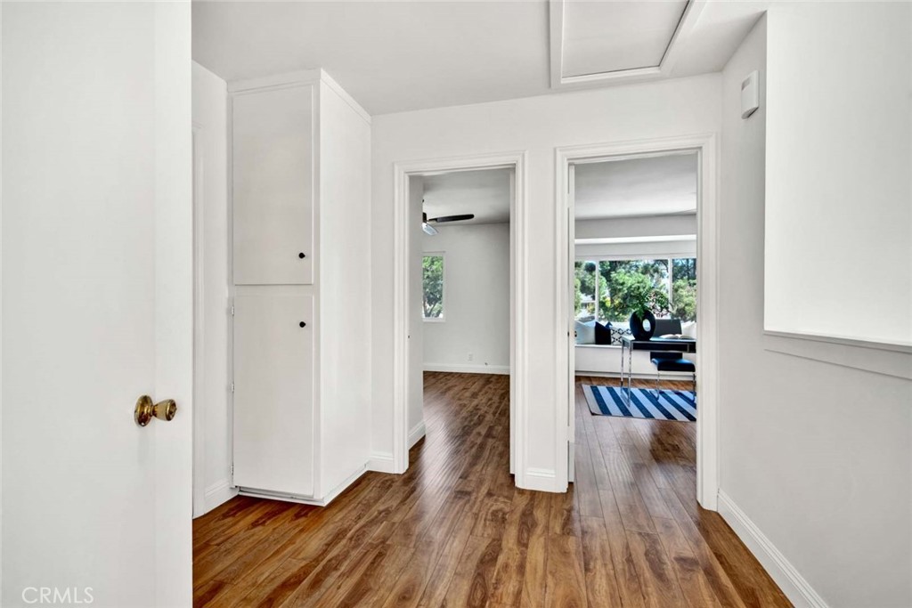 60 Willow Tree Lane Irvine, CA 92612 - Photo 40 of 74 a view of a hallway and wooden floor