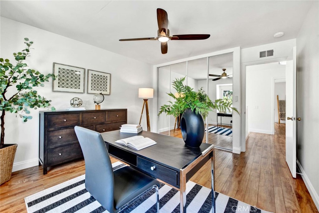 60 Willow Tree Lane Irvine, CA 92612 - Photo 42 of 74 a view of a dining room with furniture and wooden floor