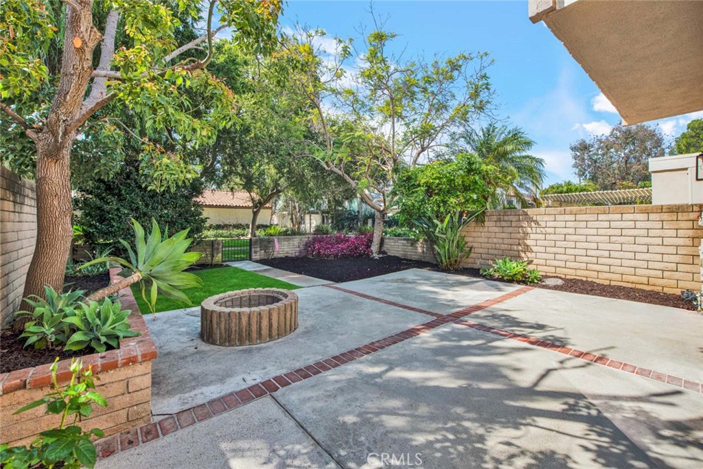 60 Willow Tree Lane Irvine, CA 92612 - Photo 46 of 74 a view of backyard with outdoor seating and green space