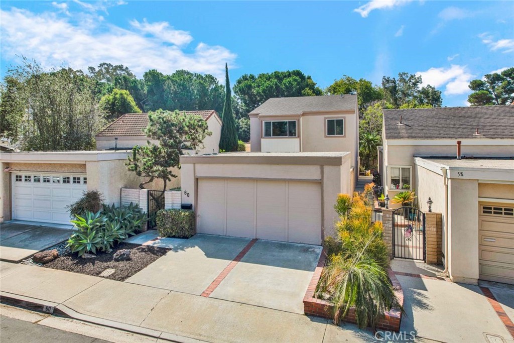 60 Willow Tree Lane Irvine, CA 92612 - Photo 56 of 74 a view of house with outdoor space and sitting area