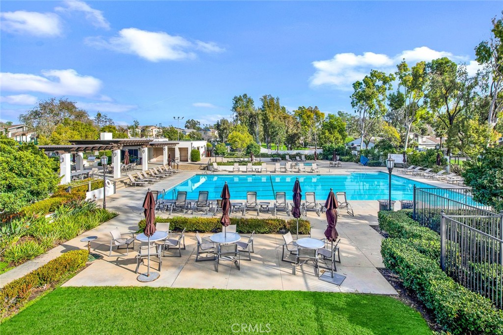 60 Willow Tree Lane Irvine, CA 92612 - Photo 59 of 74 a view of swimming pool with outdoor seating and plants