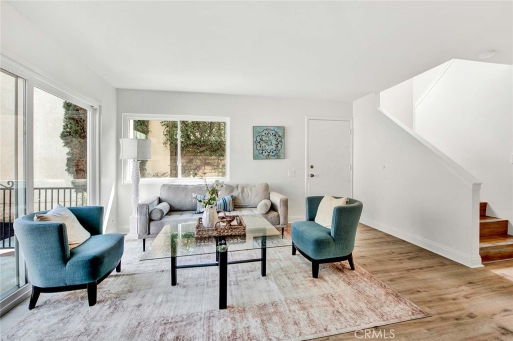 60 Willow Tree Lane Irvine, CA 92612 - Photo 10 of 74 a living room with furniture and a large window