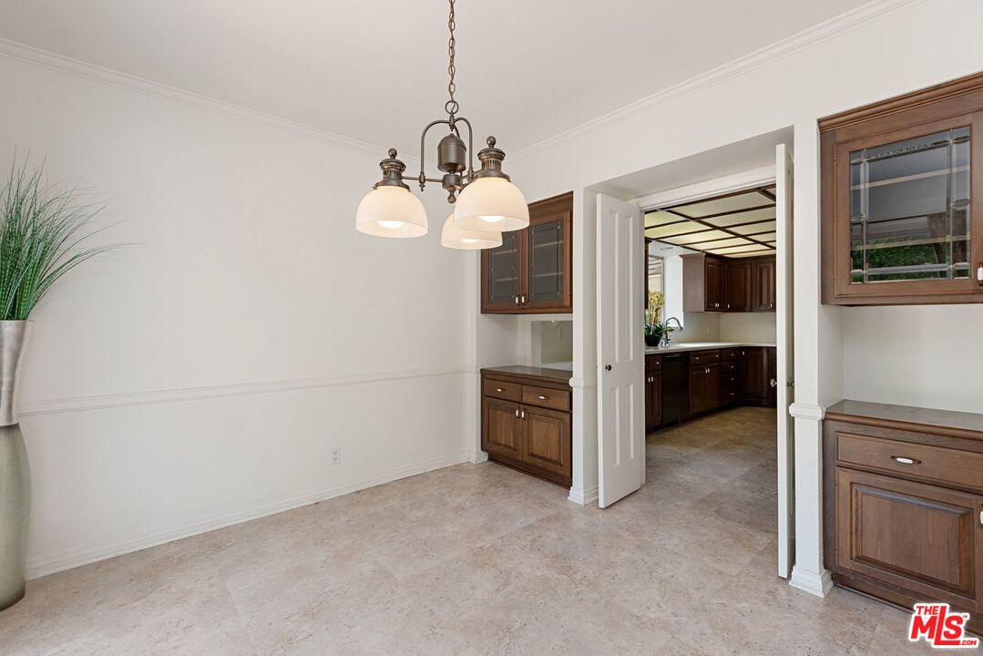 791 North Bundy Drive Los Angeles, CA 90049 - Photo 11 of 33 a view of a kitchen with a sink and dishwasher kitchen view