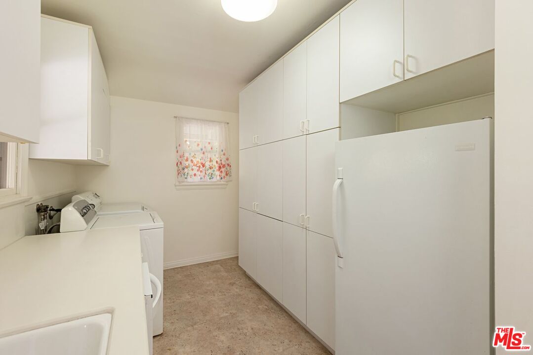 791 North Bundy Drive Los Angeles, CA 90049 - Photo 14 of 33 a room with storage and utility
