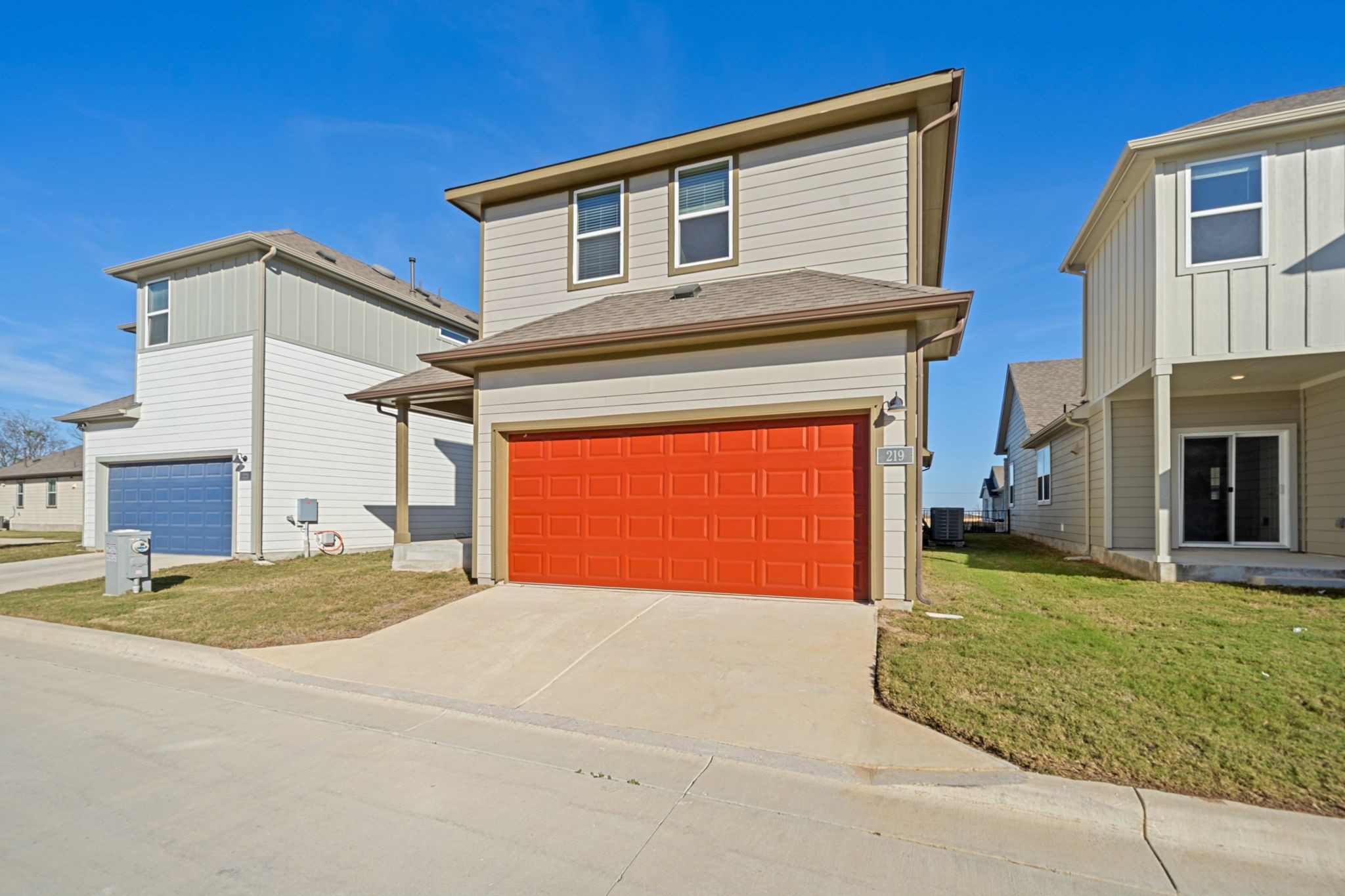 219 Pinnacle Lane Kyle, TX 78640 - Photo 2 of 20 a front view of a house with a yard and garage