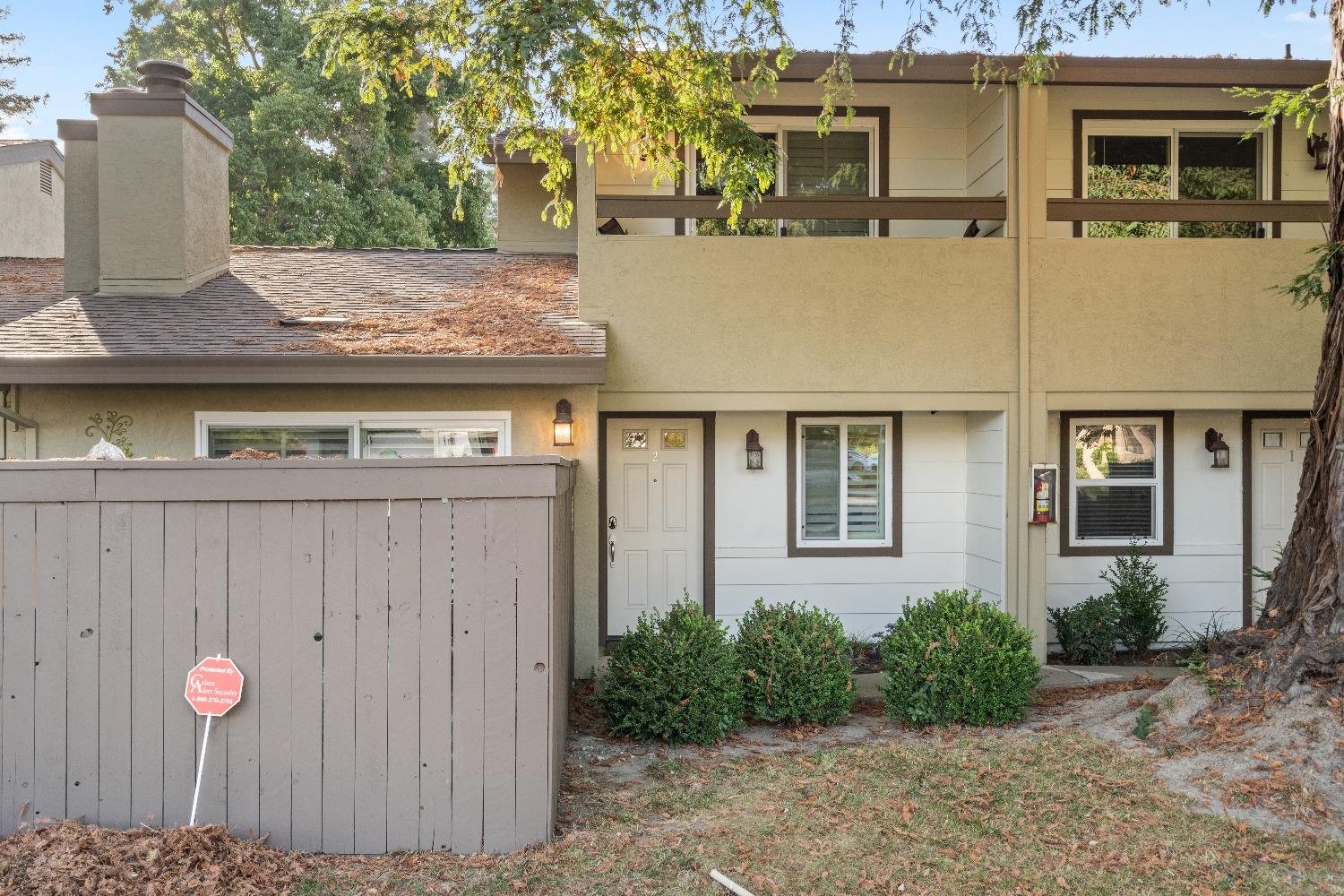 6235 Riverside Boulevard, Unit 2 Sacramento, CA 95831 - Photo 3 of 17 a front view of a house with garden