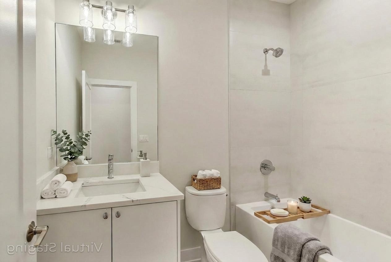 3339 North Ridgeway Avenue, Unit 2N Chicago, IL 60618 - Photo 19 of 29 a bathroom with a sink and a toilet