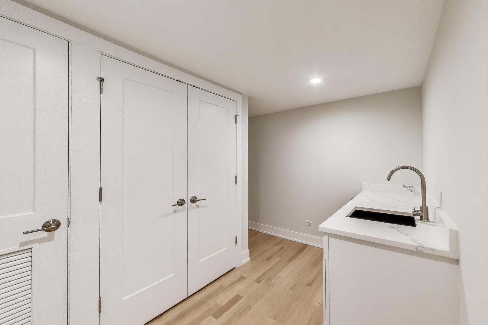 3339 North Ridgeway Avenue, Unit 2N Chicago, IL 60618 - Photo 21 of 29 a view of a hallway with a door