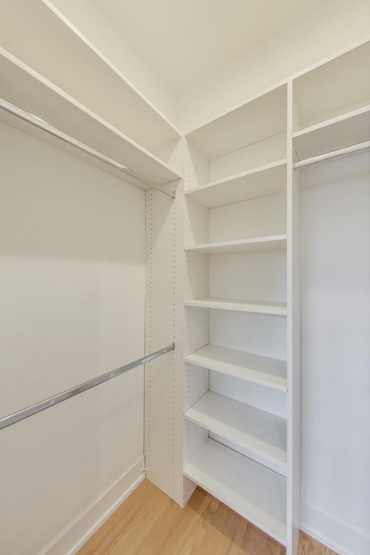 3339 North Ridgeway Avenue, Unit 2N Chicago, IL 60618 - Photo 23 of 29 a view of an empty walk in closet