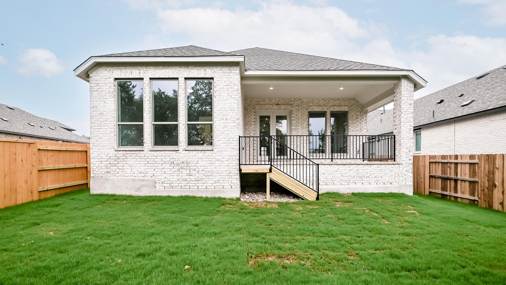 268 Basket Flower Loop Kyle, TX 78640 - Photo 11 of 27 front view of a house with a yard