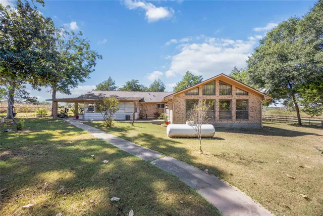 a view of a house with swimming pool
