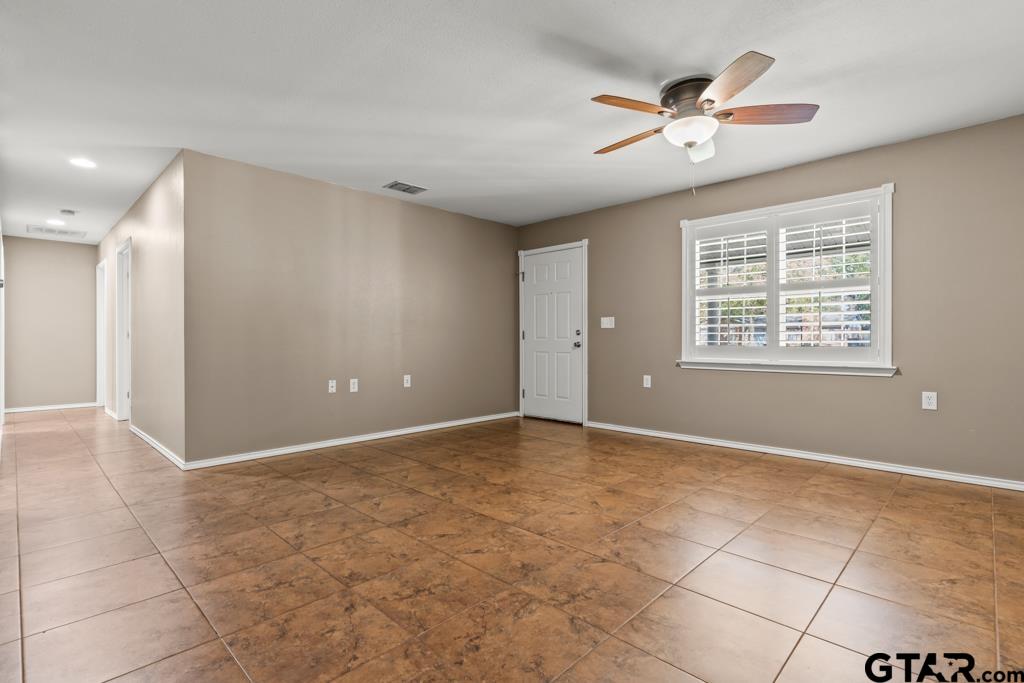 228 Cambridge Lane Longview, TX 75601 - Photo 15 of 26 a view of an empty room with a window