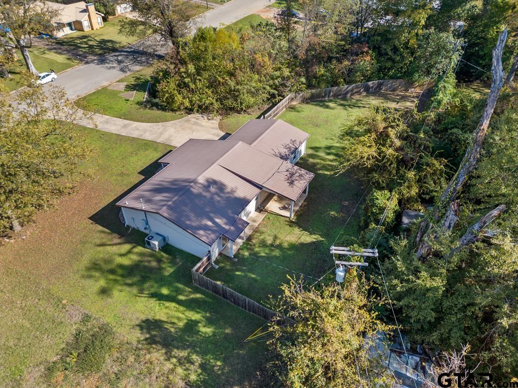 228 Cambridge Lane Longview, TX 75601 - Photo 4 of 26 an aerial view of residential houses with outdoor space