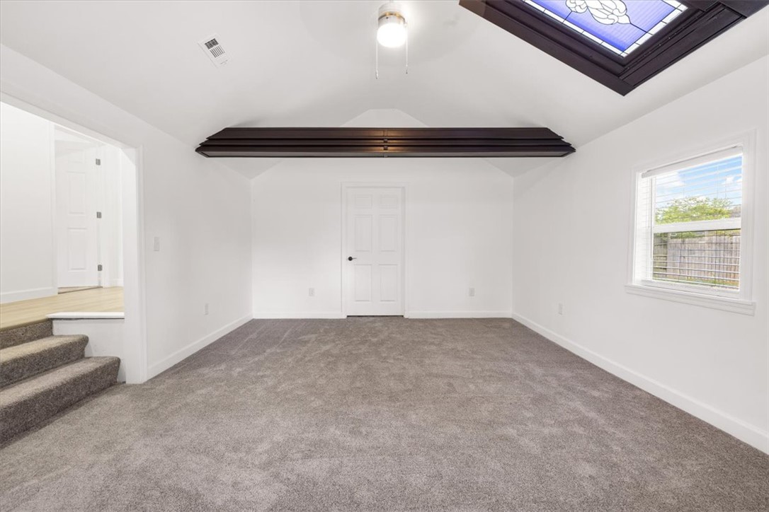 629 Little Meadow Drive Riverside, OH 45404 - Photo 35 of 48 This versatile bonus room features a skylight and a cozy carpet, offering endless possibilities.