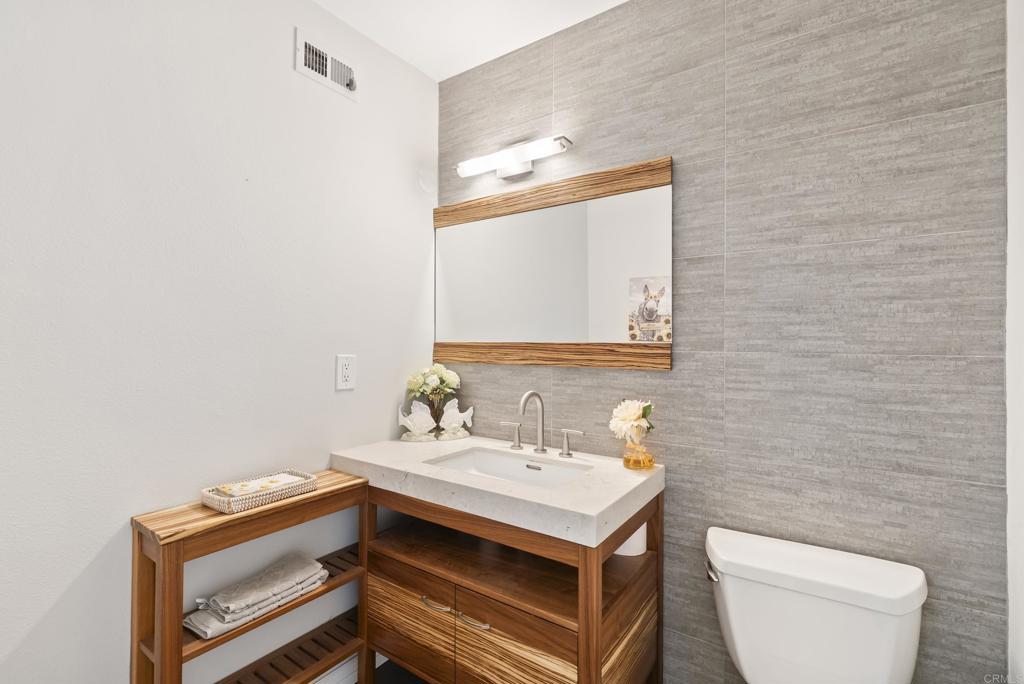 1504 Valleda Lane Encinitas, CA 92024 - Photo 28 of 56 Powder Room Off Of Family Room and Kitchen