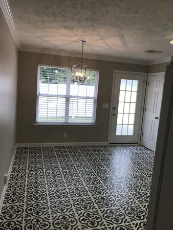 an empty room with windows