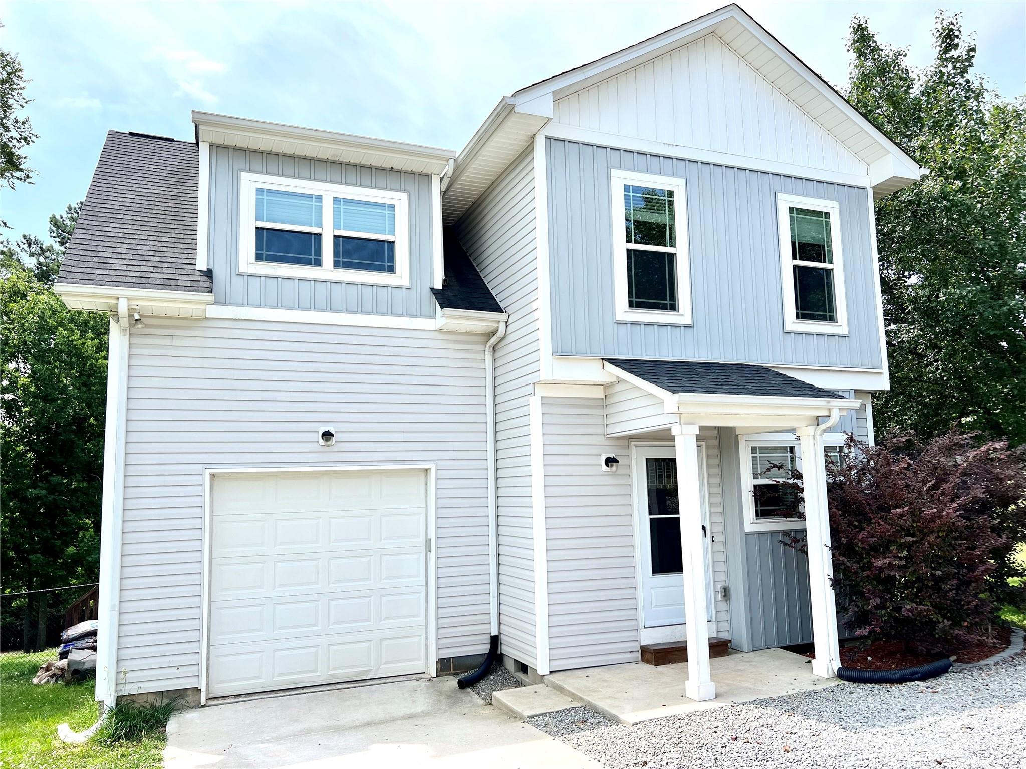 a view of a house with garage