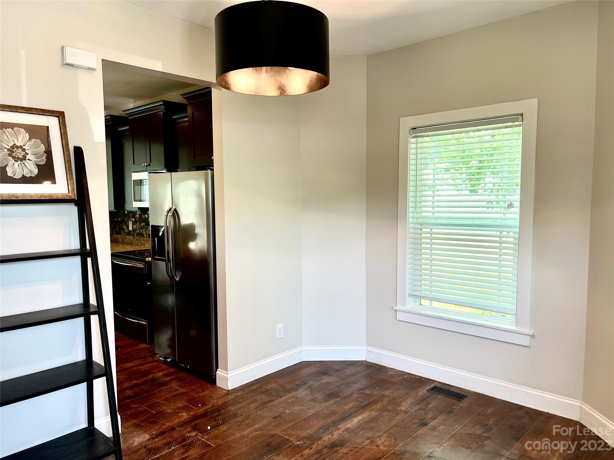 7640 Campground Road Denver, NC 28037 - Photo 2 of 9 a view of a hallway with wooden floor and closet