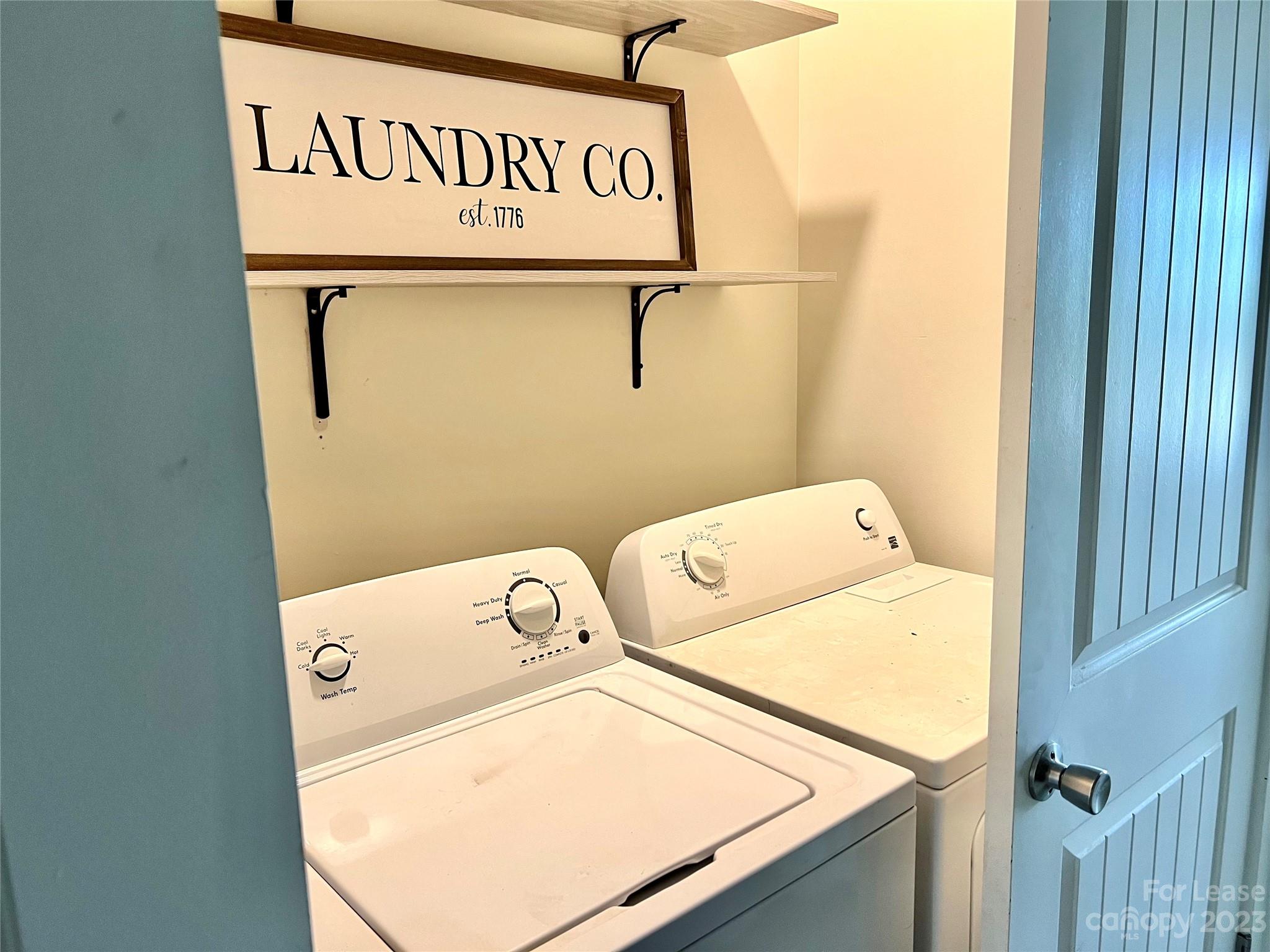 7640 Campground Road Denver, NC 28037 - Photo 7 of 9 a utility room with dryer and washer