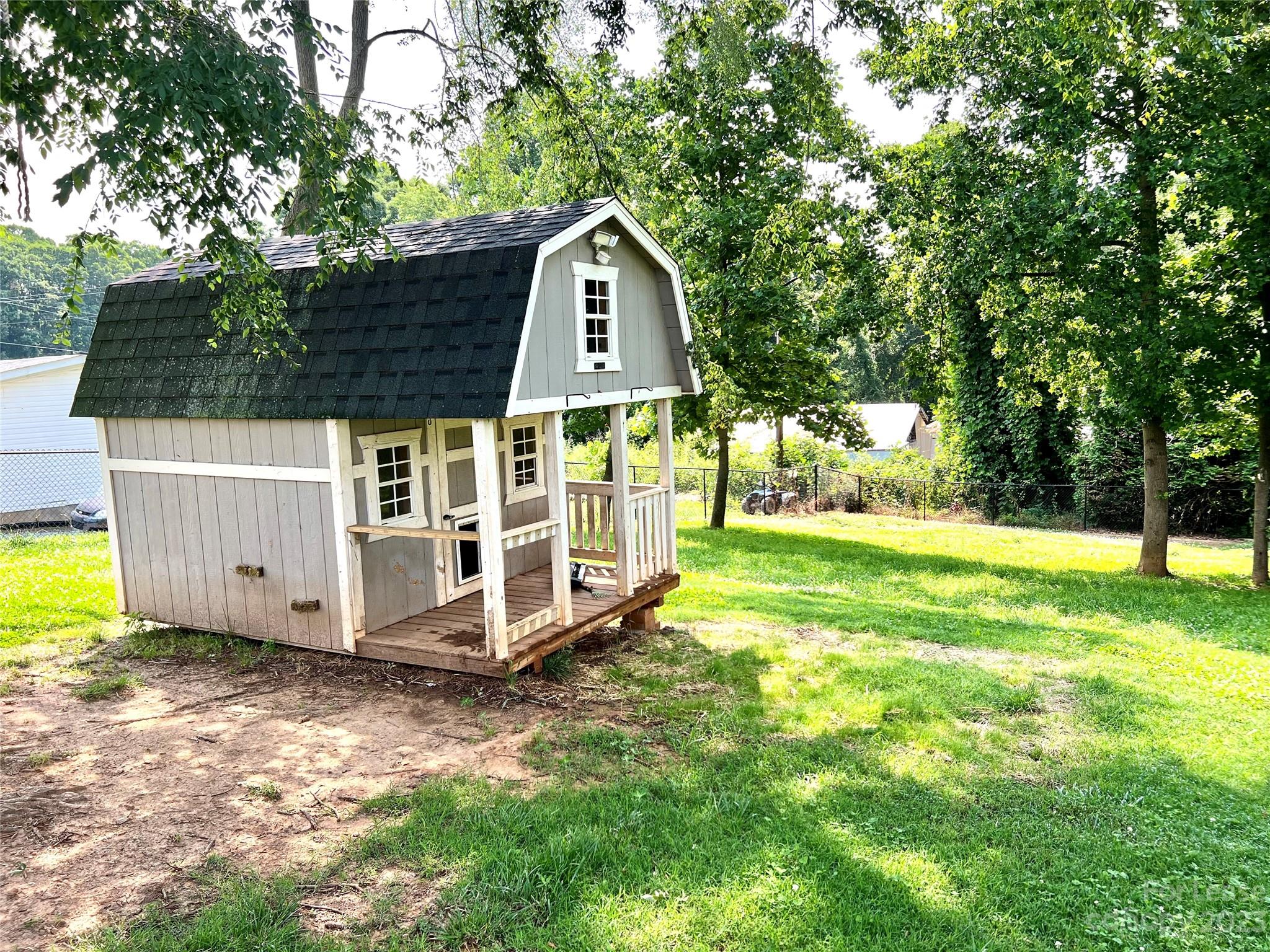 7640 Campground Road Denver, NC 28037 - Photo 8 of 9 a view of a house with a yard