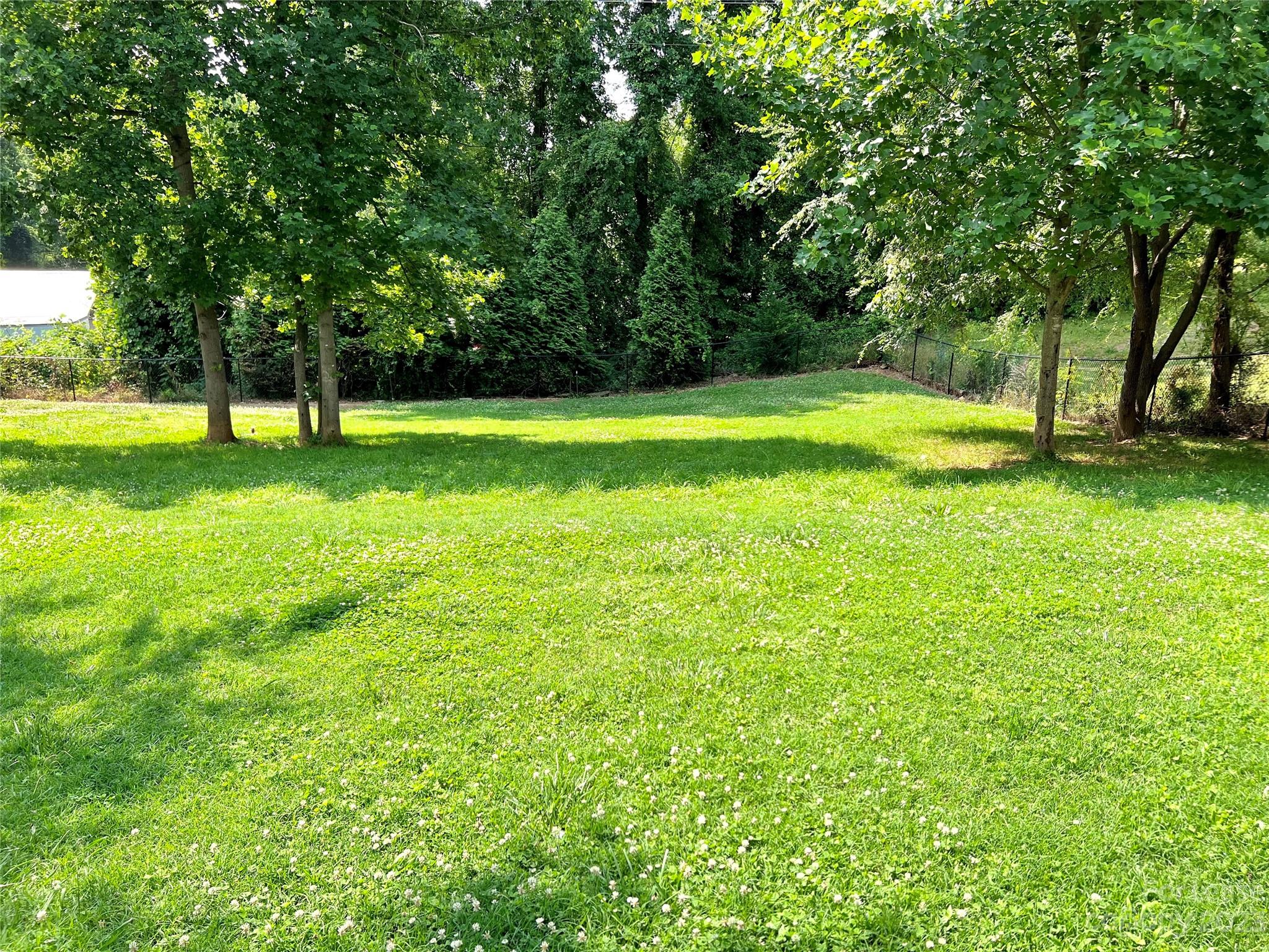 7640 Campground Road Denver, NC 28037 - Photo 9 of 9 a view of a yard with a trees