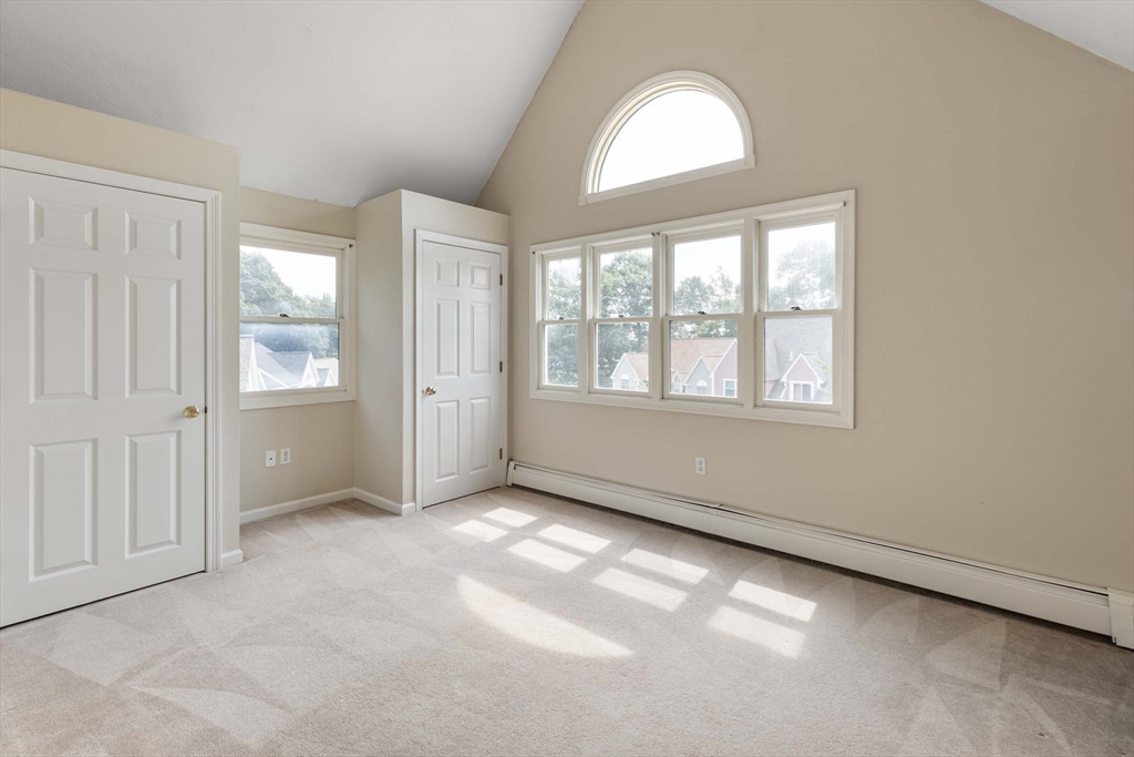 21 Midgley Lane Worcester, MA 01604 - Photo 20 of 25 an empty room with windows