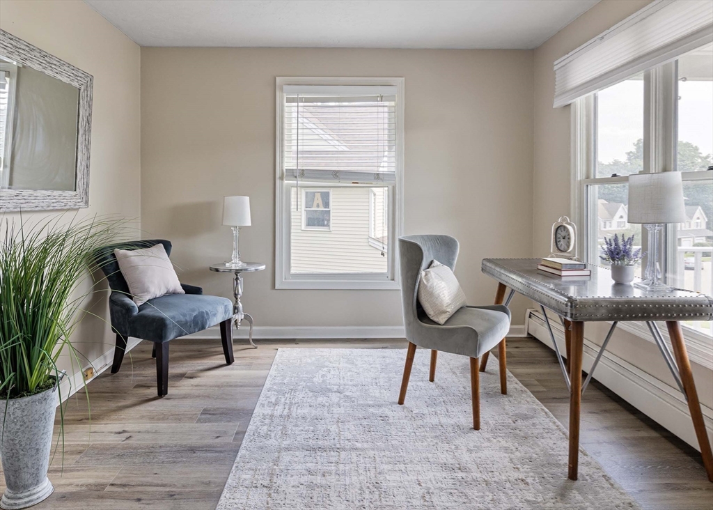 21 Midgley Lane Worcester, MA 01604 - Photo 5 of 25 a living room with furniture and a potted plant
