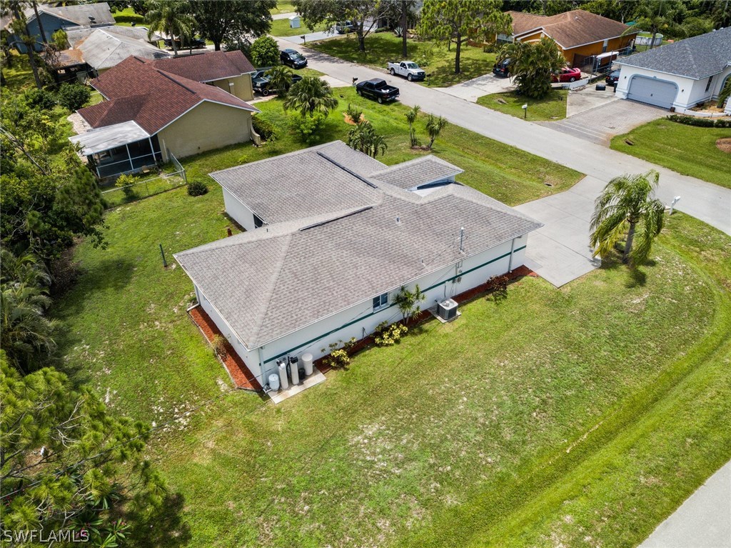 18205 Apple Road Fort Myers, FL 33967 - Photo 21 of 25 an aerial view of a house with swimming pool garden and patio