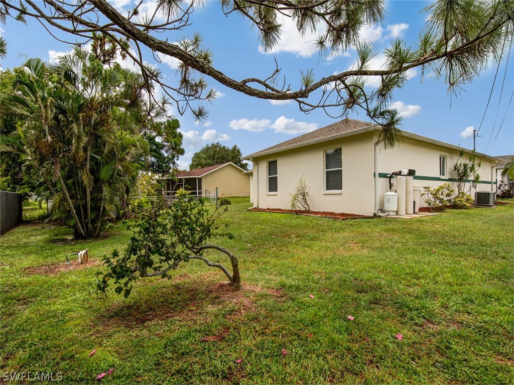 18205 Apple Road Fort Myers, FL 33967 - Photo 23 of 25 a view of a house with a yard