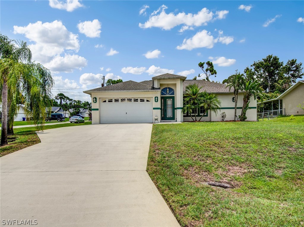 18205 Apple Road Fort Myers, FL 33967 - Photo 24 of 25 a view of building with garden