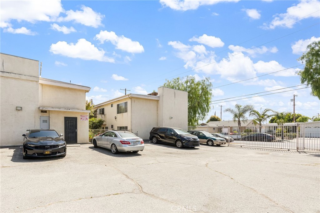 11151 Arminta Street, Unit 201A Sun Valley, CA 91352 - Photo 14 of 14 a cars parked in front of a house