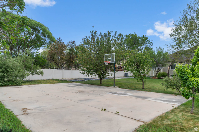 439 East 13540 South Draper, UT 84020 - Photo 42 of 46 Concrete sport court featuring an adjustable basketball hoop